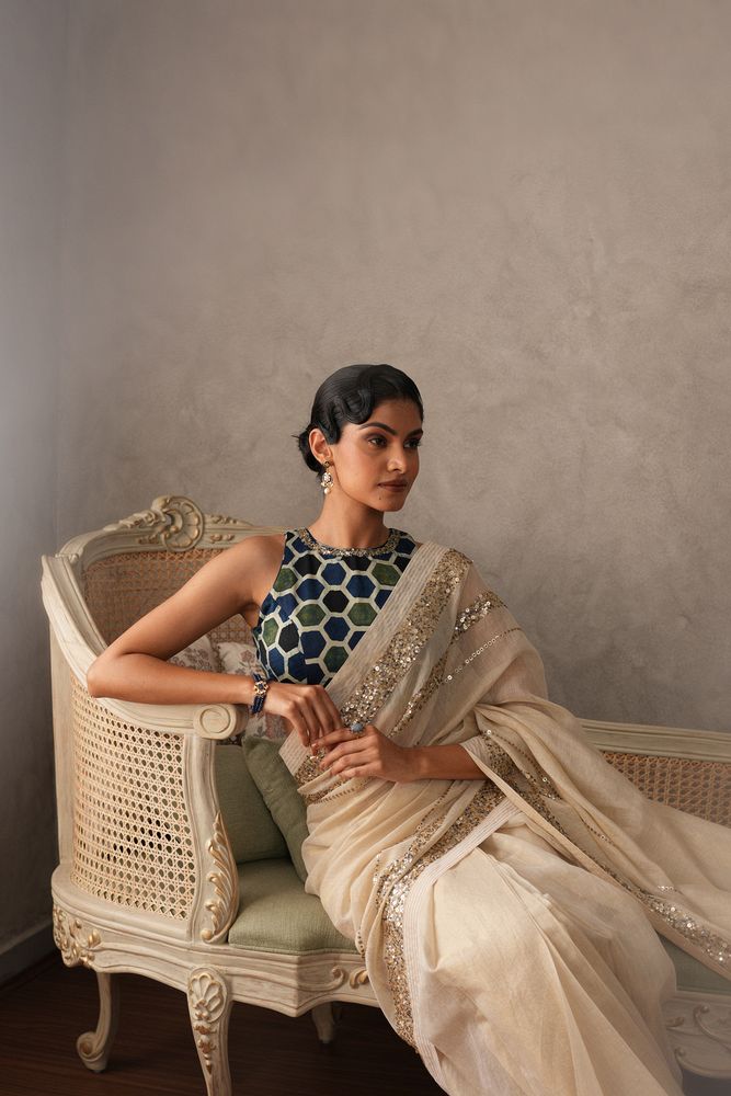 Ivory tissue saree with sequinned borders
