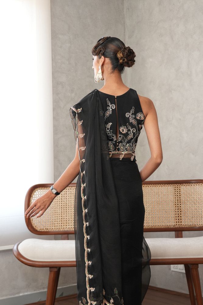 Black organza scalloped edge saree with paisleys embroidery blouse