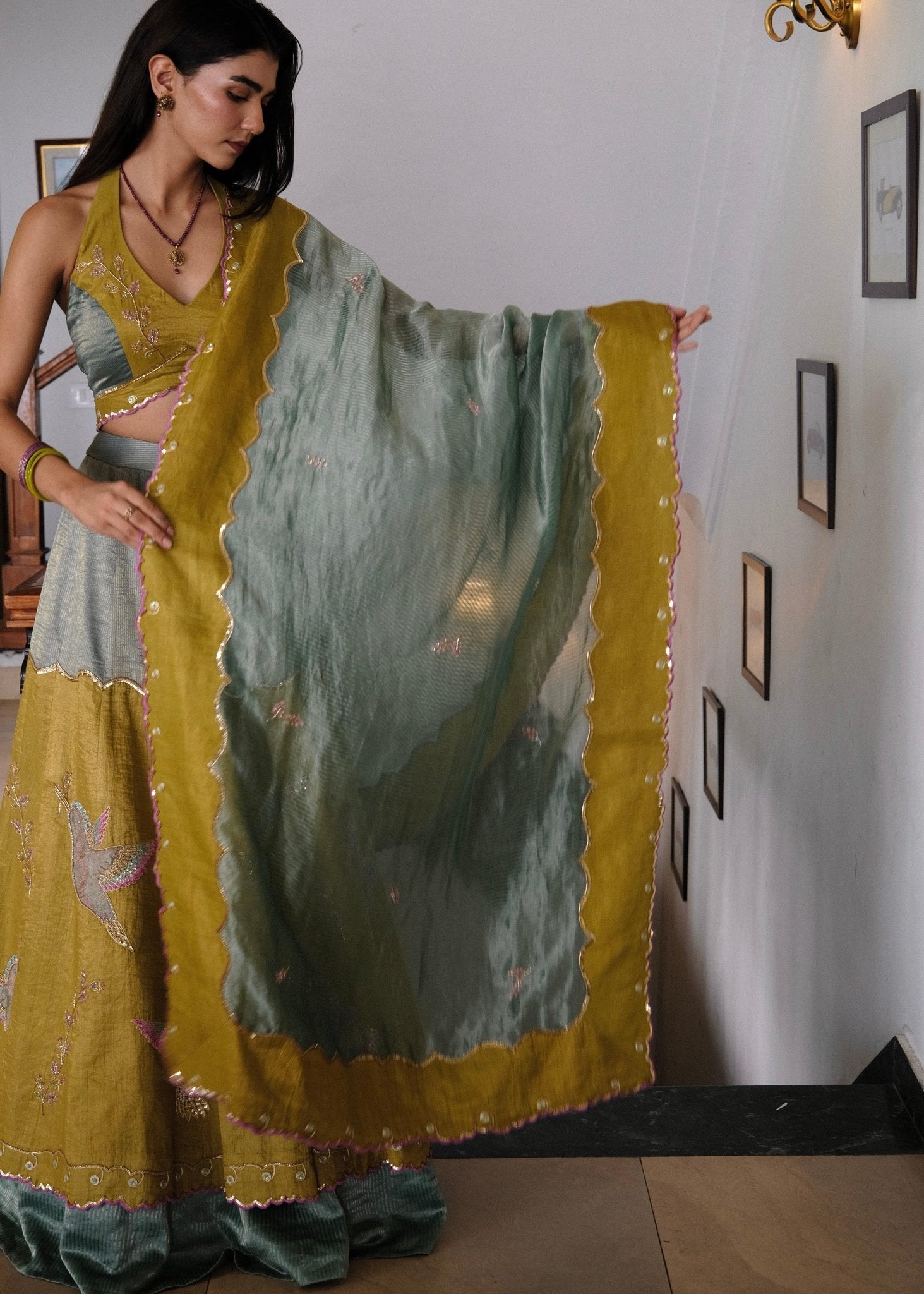 Eggshell blue and mehndi tissue chanderi layered lehenga, halter blouse and striped tissue chanderi dupatta - Sohni
