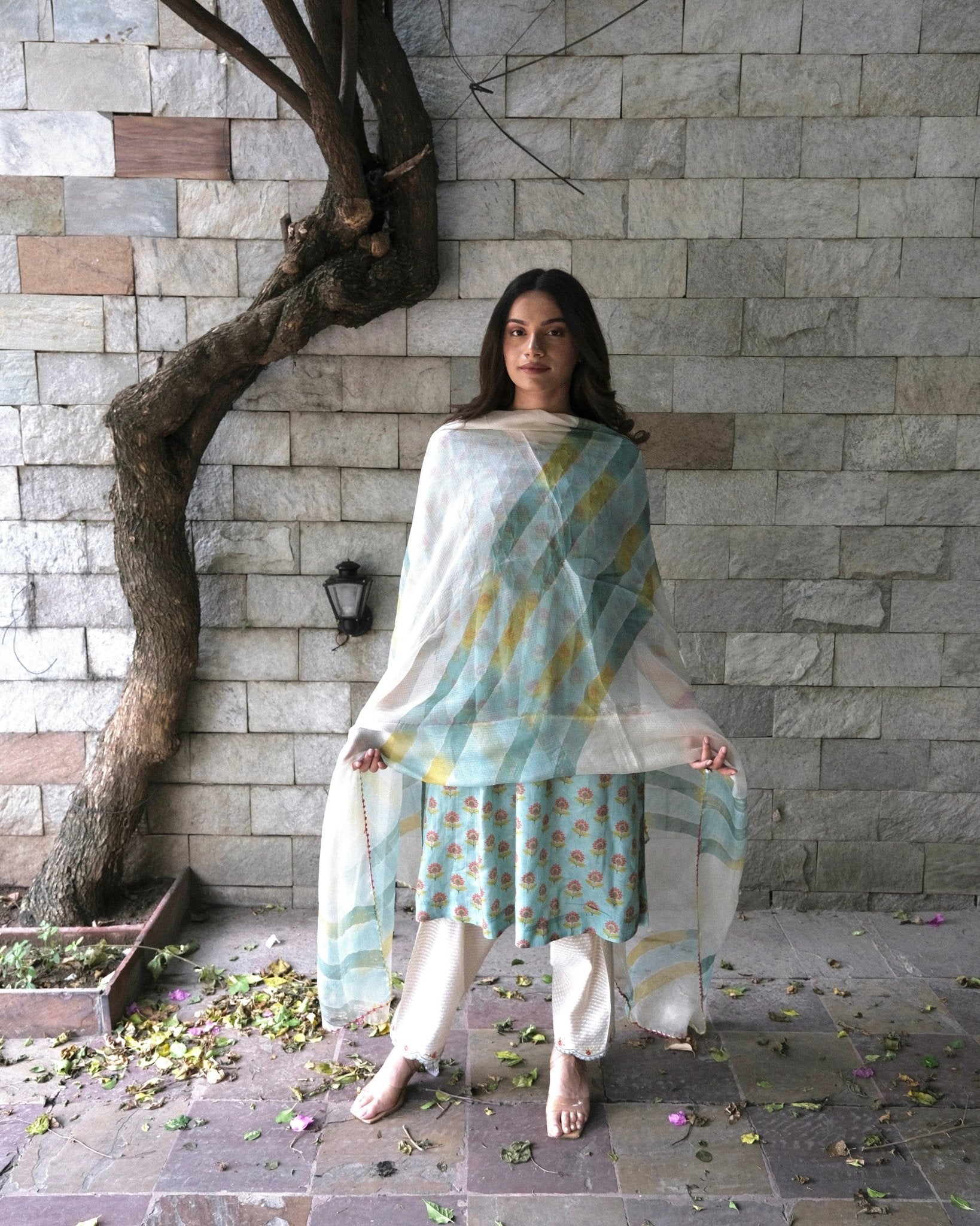 Eggshell blue booti jaal muslin honeycomb smocked kurta, dobby salwar and lehriya dupatta - Sohni