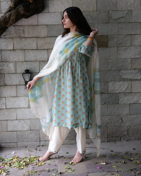 Eggshell blue booti jaal muslin honeycomb smocked kurta, dobby salwar and lehriya dupatta - Sohni
