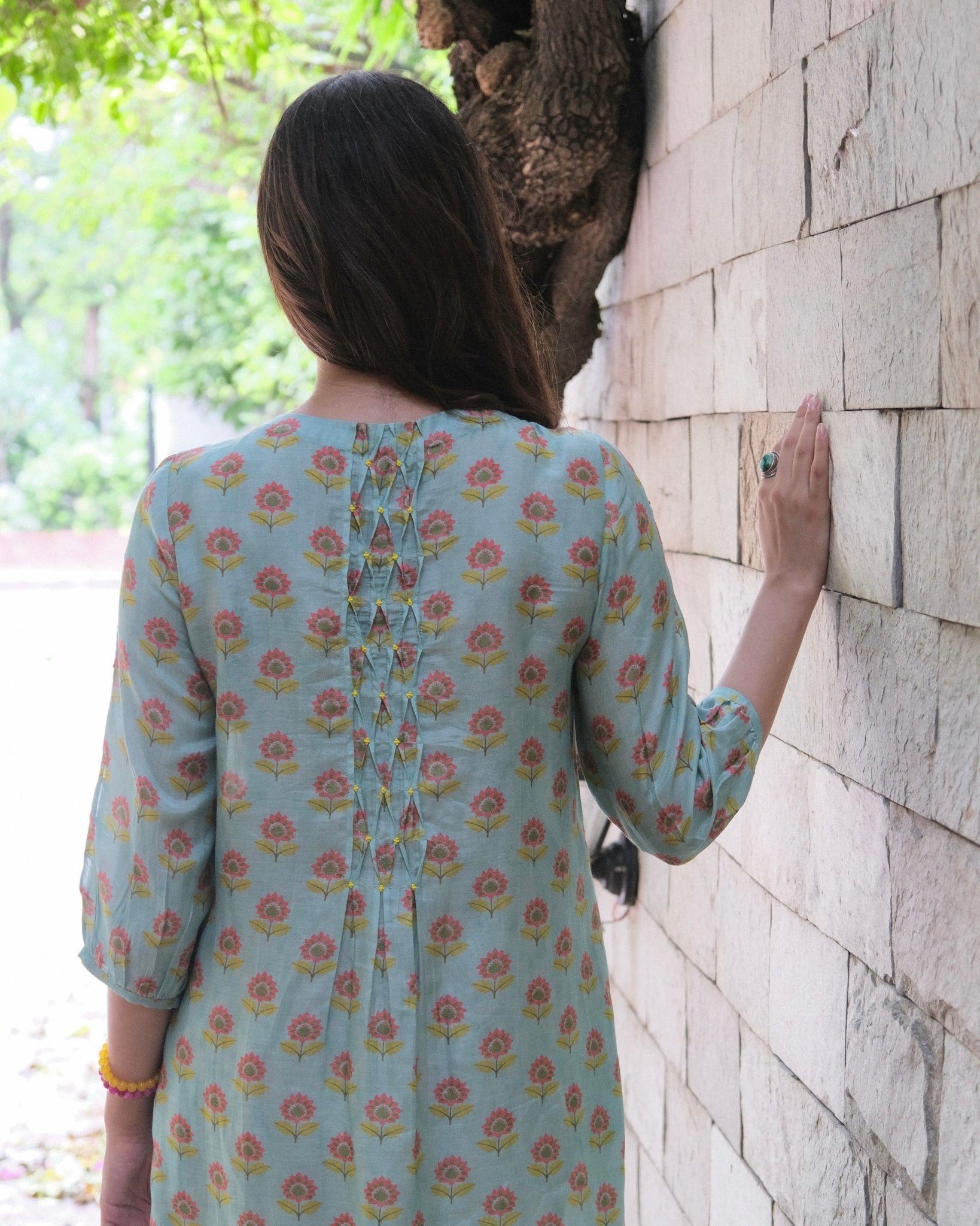 Eggshell blue booti jaal muslin honeycomb smocked kurta, dobby salwar and lehriya dupatta - Sohni