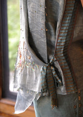 Eggshell striped tissue chanderi asymmetrical wrap top and tapered pants with monkey motif embroidery - Sohni