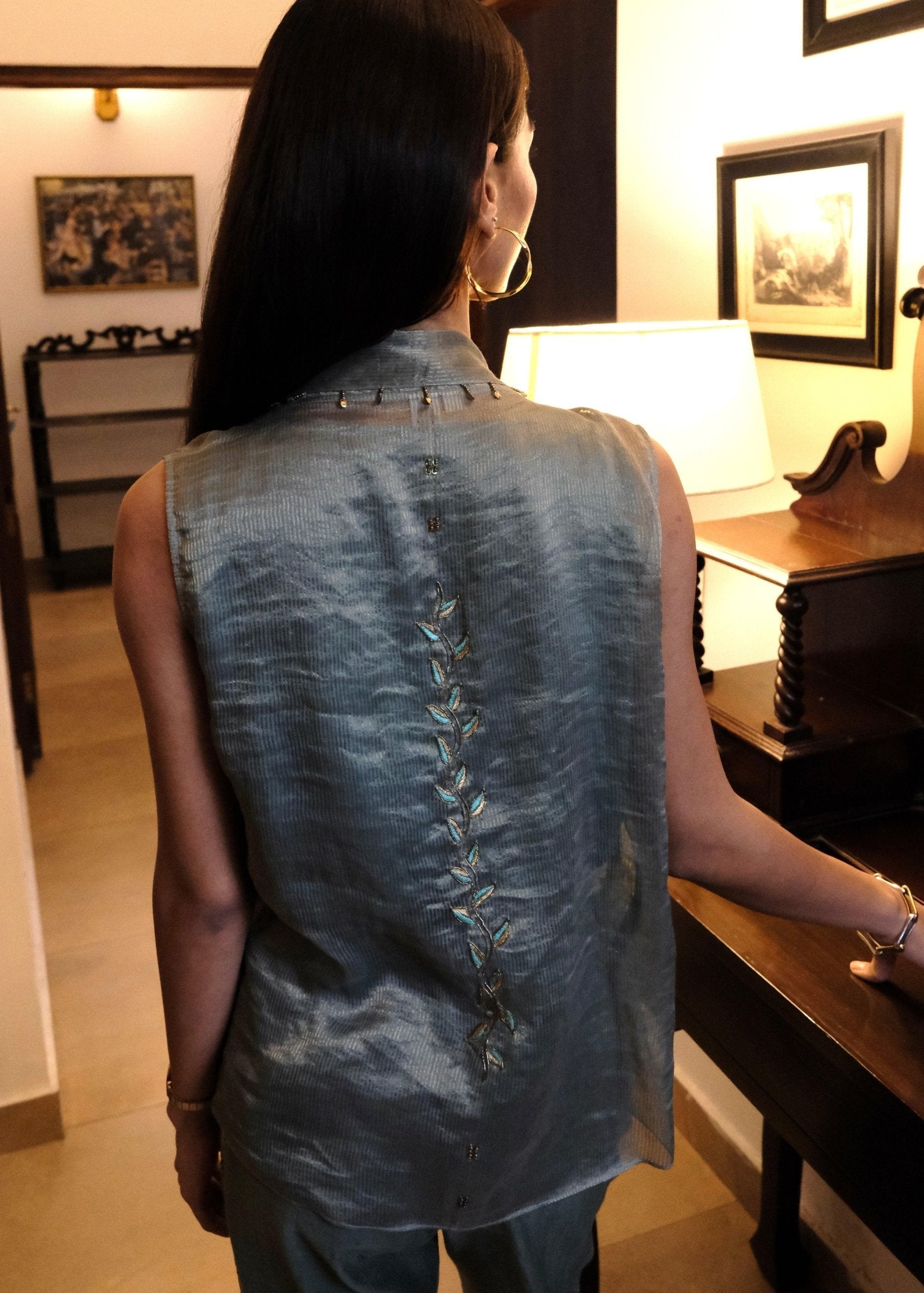 Eggshell striped tissue chanderi asymmetrical wrap top and tapered pants with monkey motif embroidery - Sohni