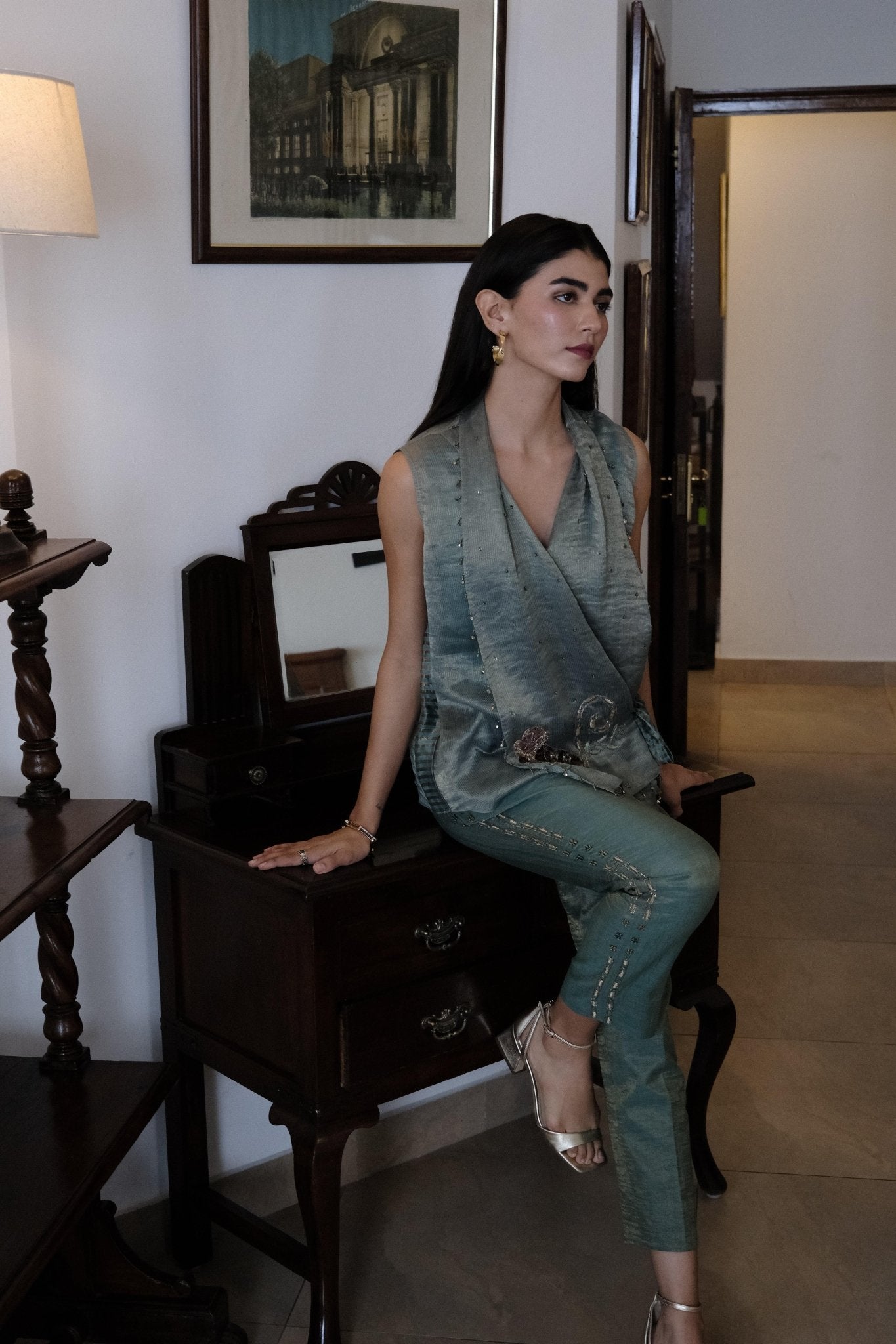 Eggshell striped tissue chanderi asymmetrical wrap top and tapered pants with monkey motif embroidery - Sohni