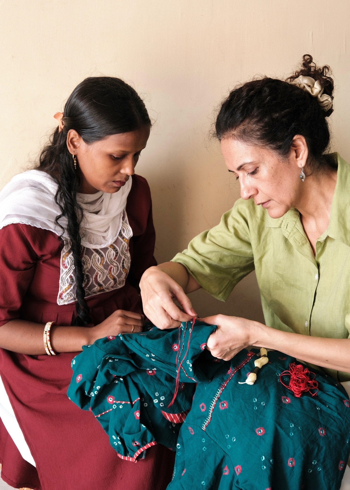Emerald green bandhej shirt with hand embroidery detailing - Sohni