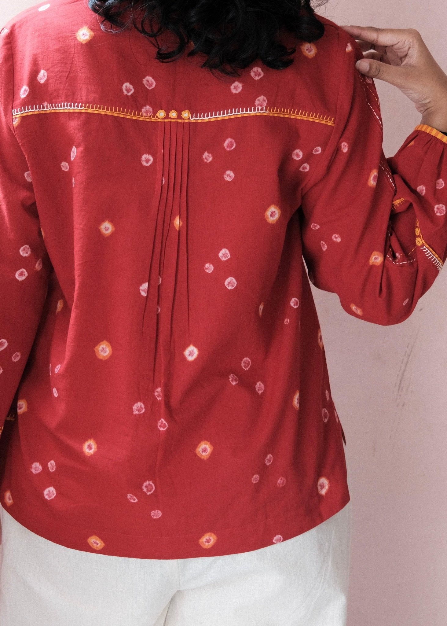Flame red bandhej shirt with hand embroidery detailing - Sohni