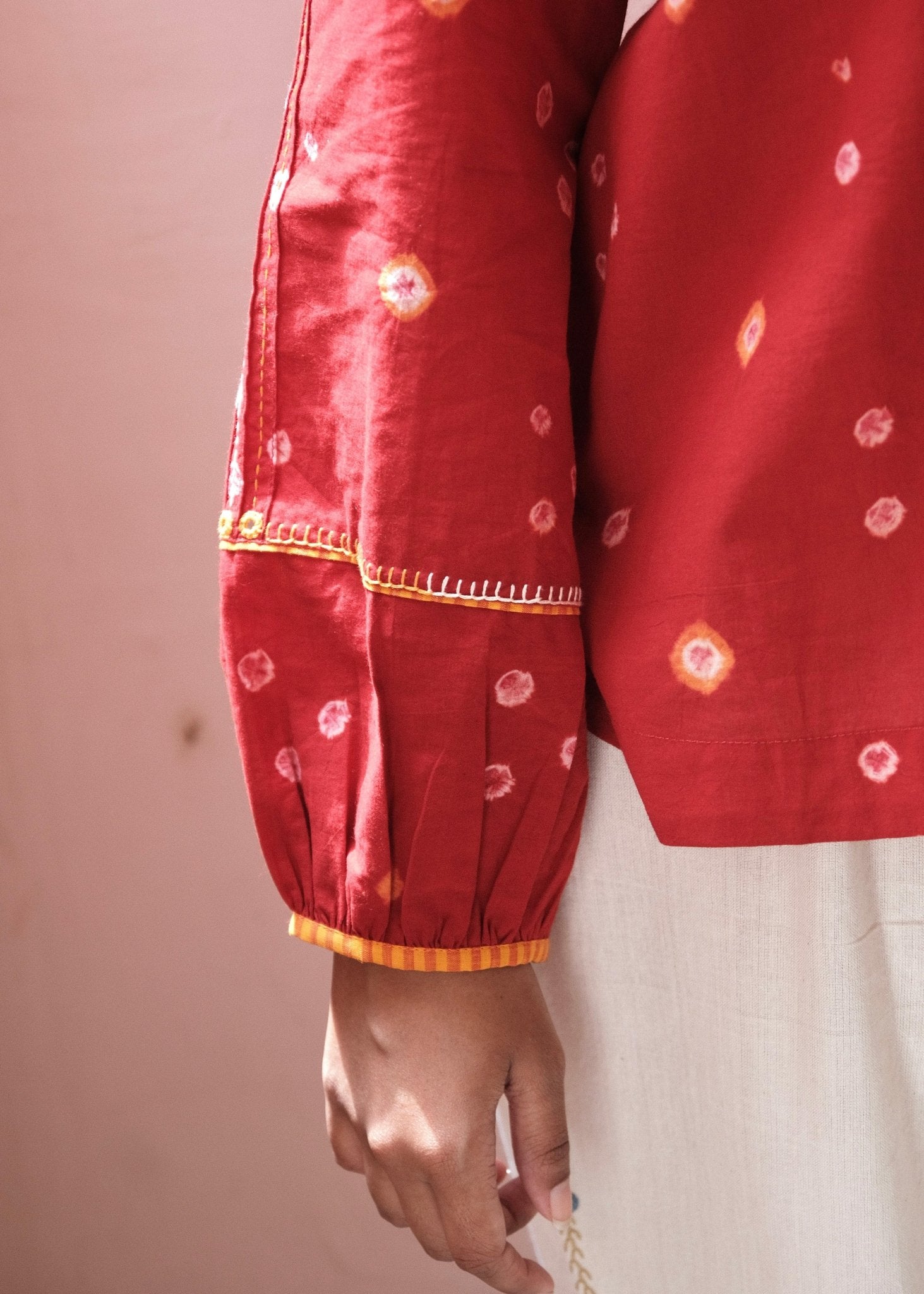 Flame red bandhej shirt with hand embroidery detailing - Sohni