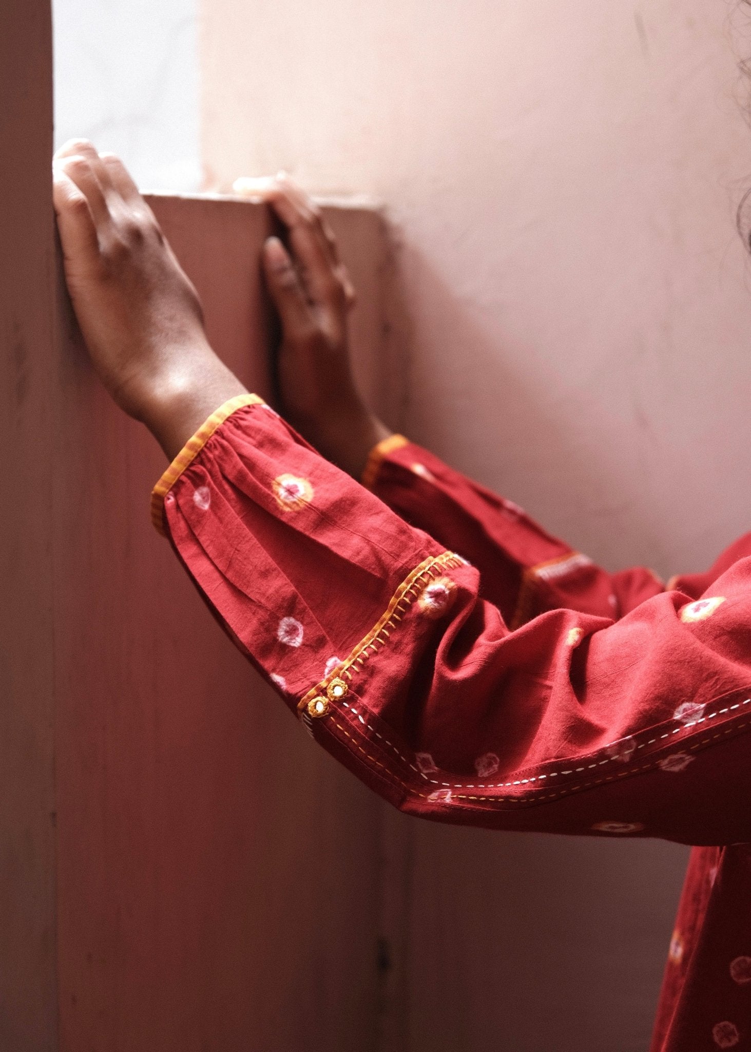 Flame red bandhej shirt with hand embroidery detailing - Sohni