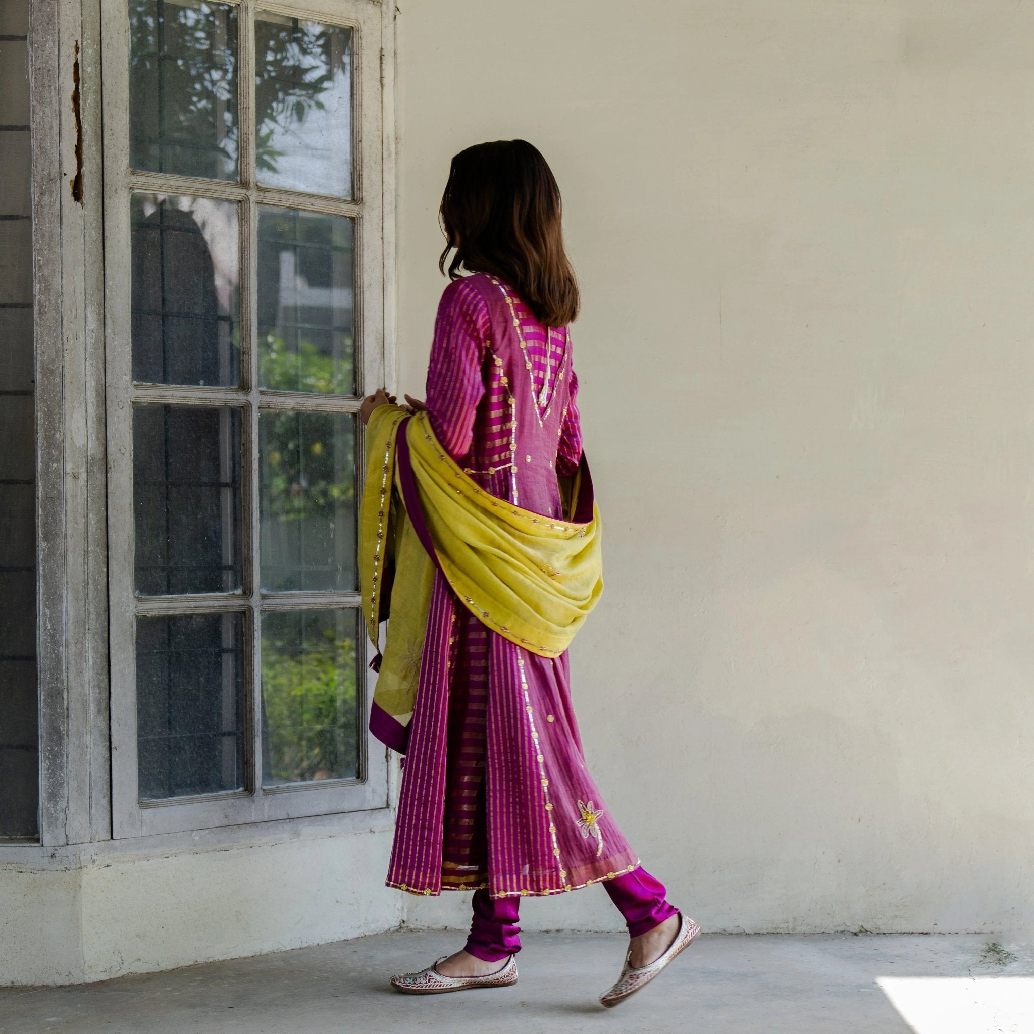 Magenta striped tissue kalidaar kurta with churidaar and chartreuse tissue dupatta - Sohni