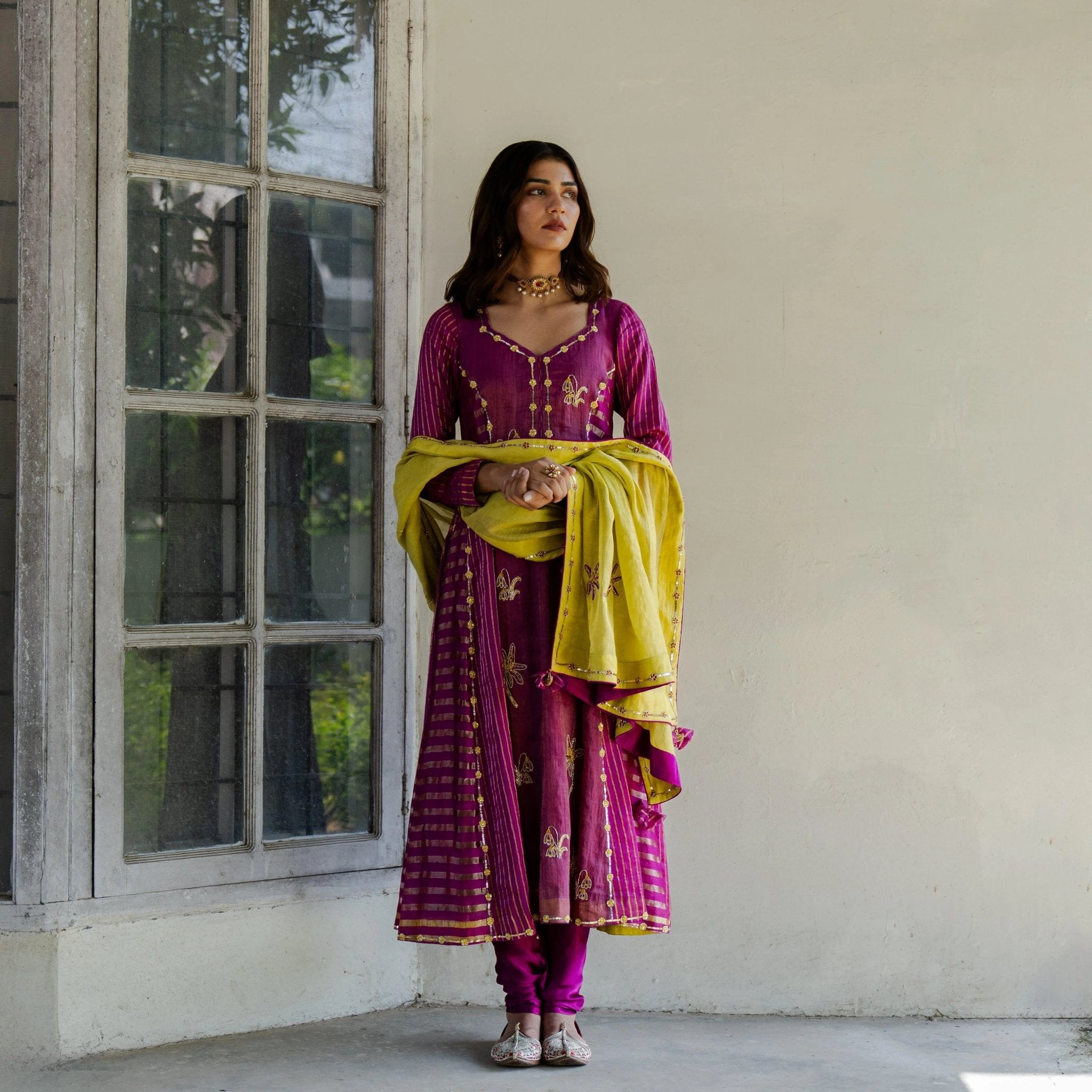 Magenta striped tissue kalidaar kurta with churidaar and chartreuse tissue dupatta - Sohni