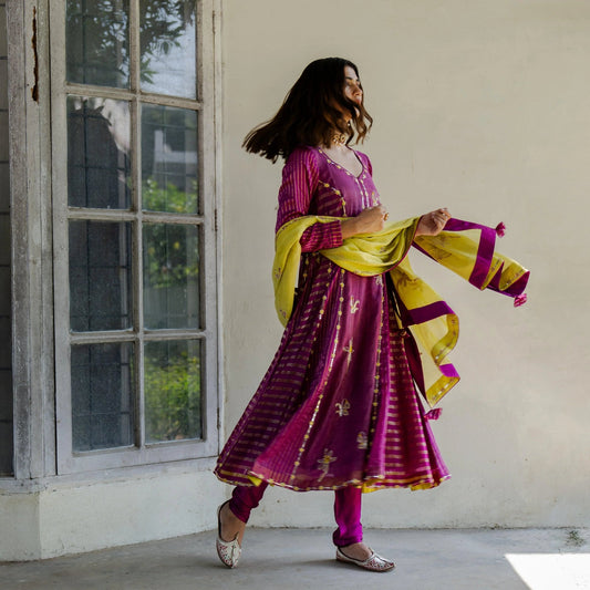 Magenta striped tissue kalidaar kurta with churidaar and chartreuse tissue dupatta - Sohni