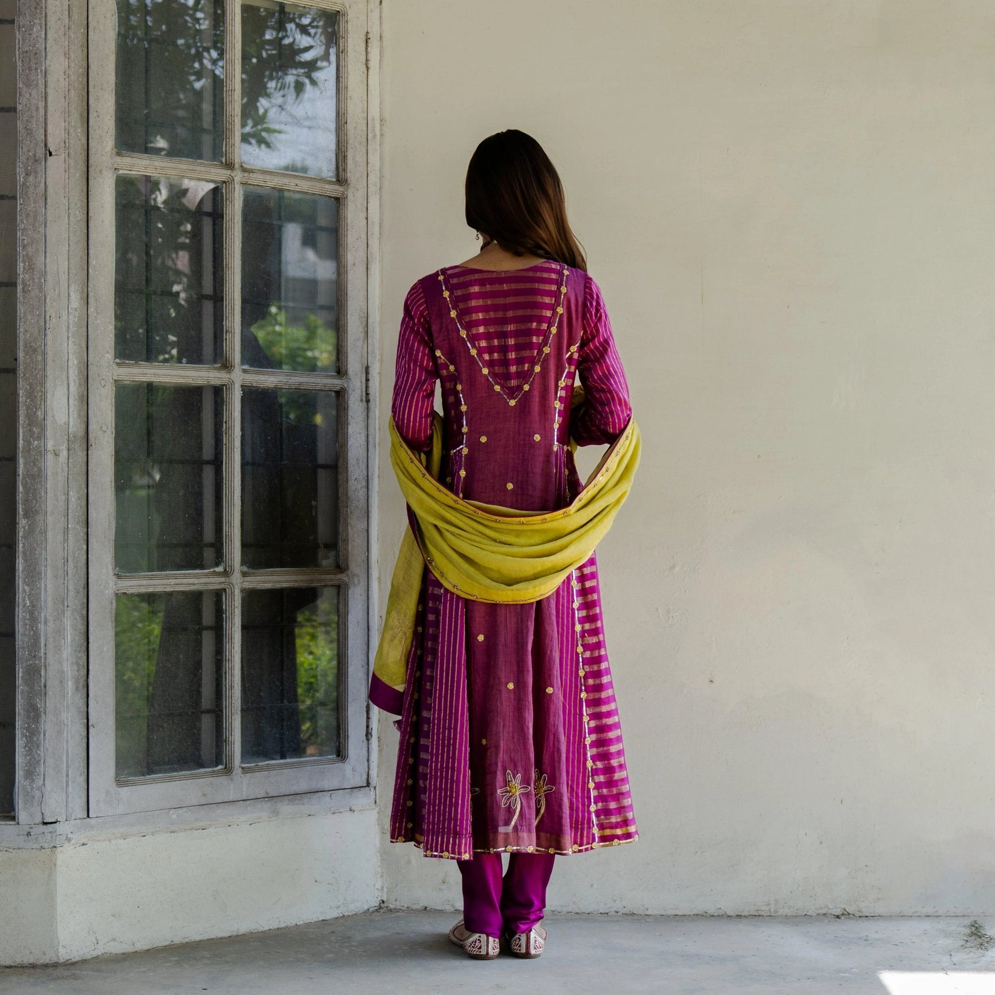 Magenta striped tissue kalidaar kurta with churidaar and chartreuse tissue dupatta - Sohni