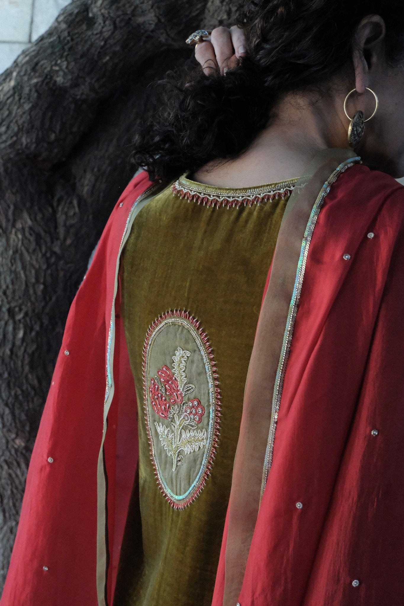 Olive Green kalidaar velvet kurta with silk salwar and red silk dupatta - Sohni