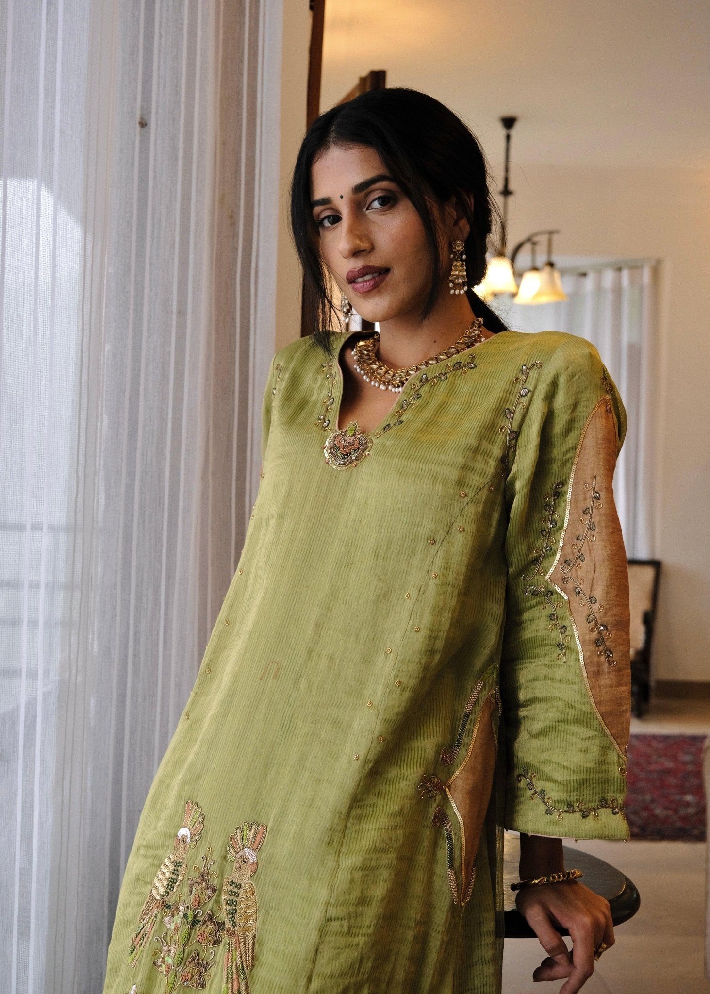 Sap green striped tissue chanderi kurta set with peach gold booti organza dupatta and exotic birds embroidery - Sohni