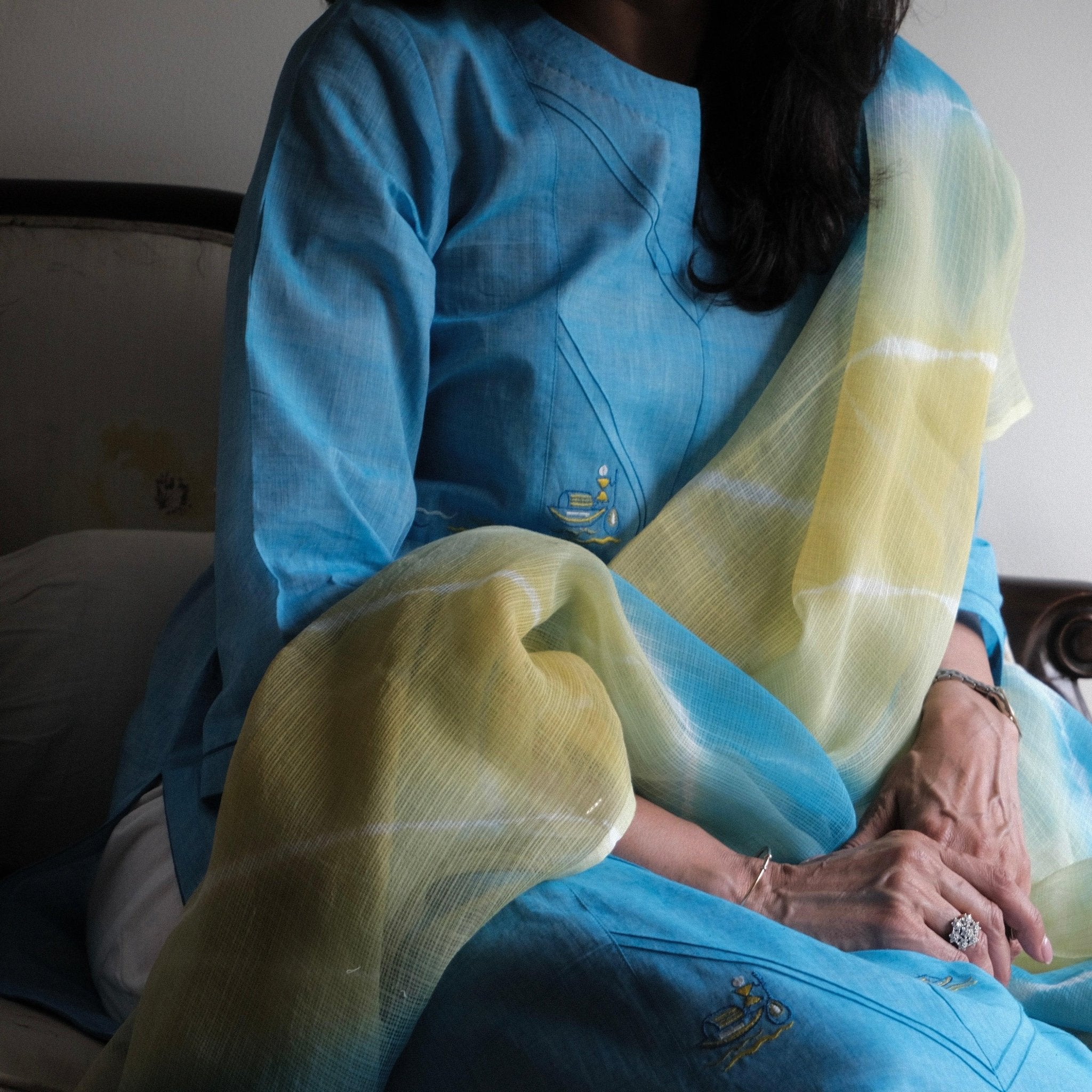 Sky blue mangalgiri pintucked kurta with Warli boat motif embroidery, white dobby salwar and lehriya kota doria dupatta - Sohni