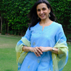 Sky blue mangalgiri pintucked kurta with Warli boat motif embroidery, white dobby salwar and lehriya kota doria dupatta - Sohni