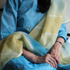 Sky blue mangalgiri pintucked kurta with Warli boat motif embroidery, white dobby salwar and lehriya kota doria dupatta - Sohni