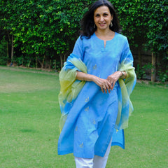 Sky blue mangalgiri pintucked kurta with Warli boat motif embroidery, white dobby salwar and lehriya kota doria dupatta - Sohni