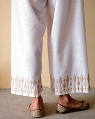 White handloom cotton palazzo pants with beige dori embroidery - Sohni