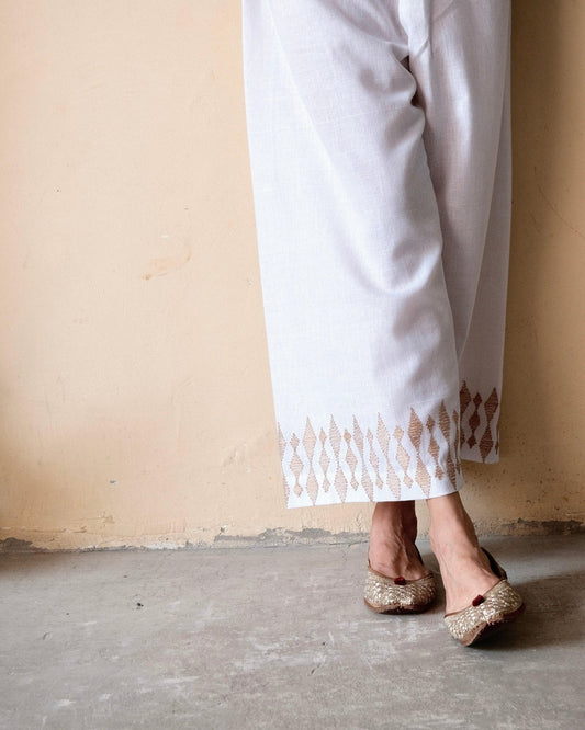 White handloom cotton palazzo pants with beige dori embroidery - Sohni
