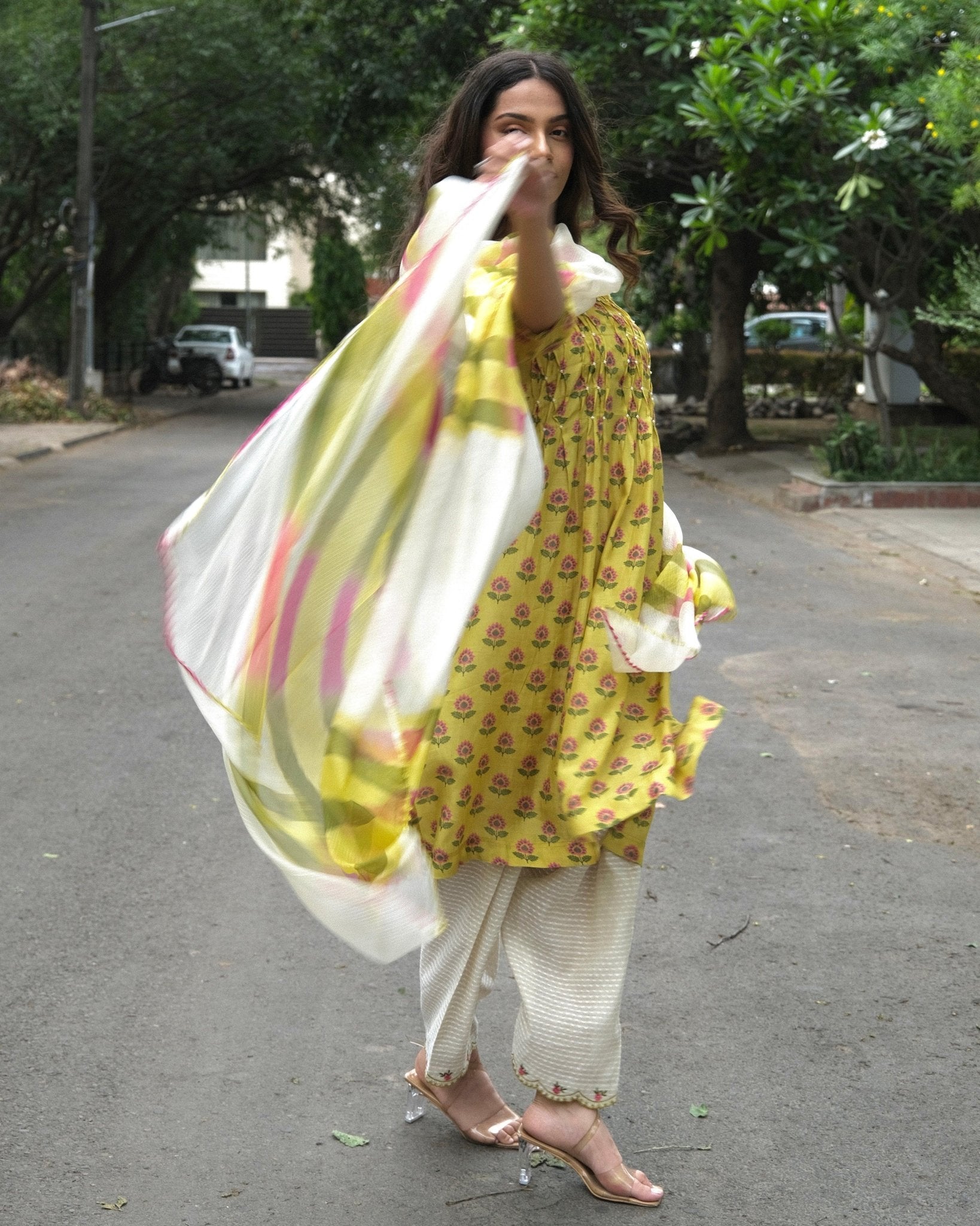Yellow booti jaal muslin honeycomb smocked kurta, dobby salwar and lehriya dupatta - Sohni