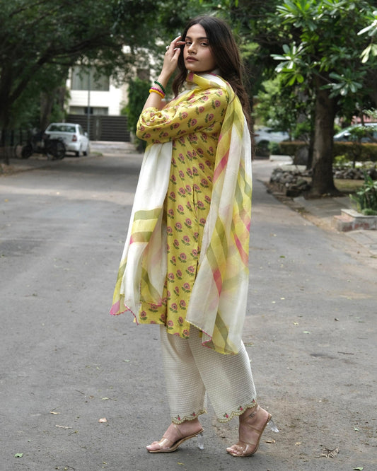 Yellow booti jaal muslin honeycomb smocked kurta, dobby salwar and lehriya dupatta - Sohni