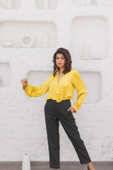 Chartreuse modal satin top with ruffles and had embroidered cuffs - Sohni