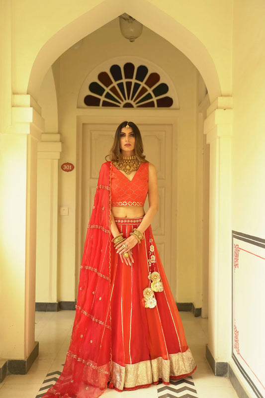 Devkali red organza kalidaar lehnga - Sohni