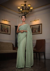Pistachio green triangle motifs embroidered saree with blouse. - Sohni