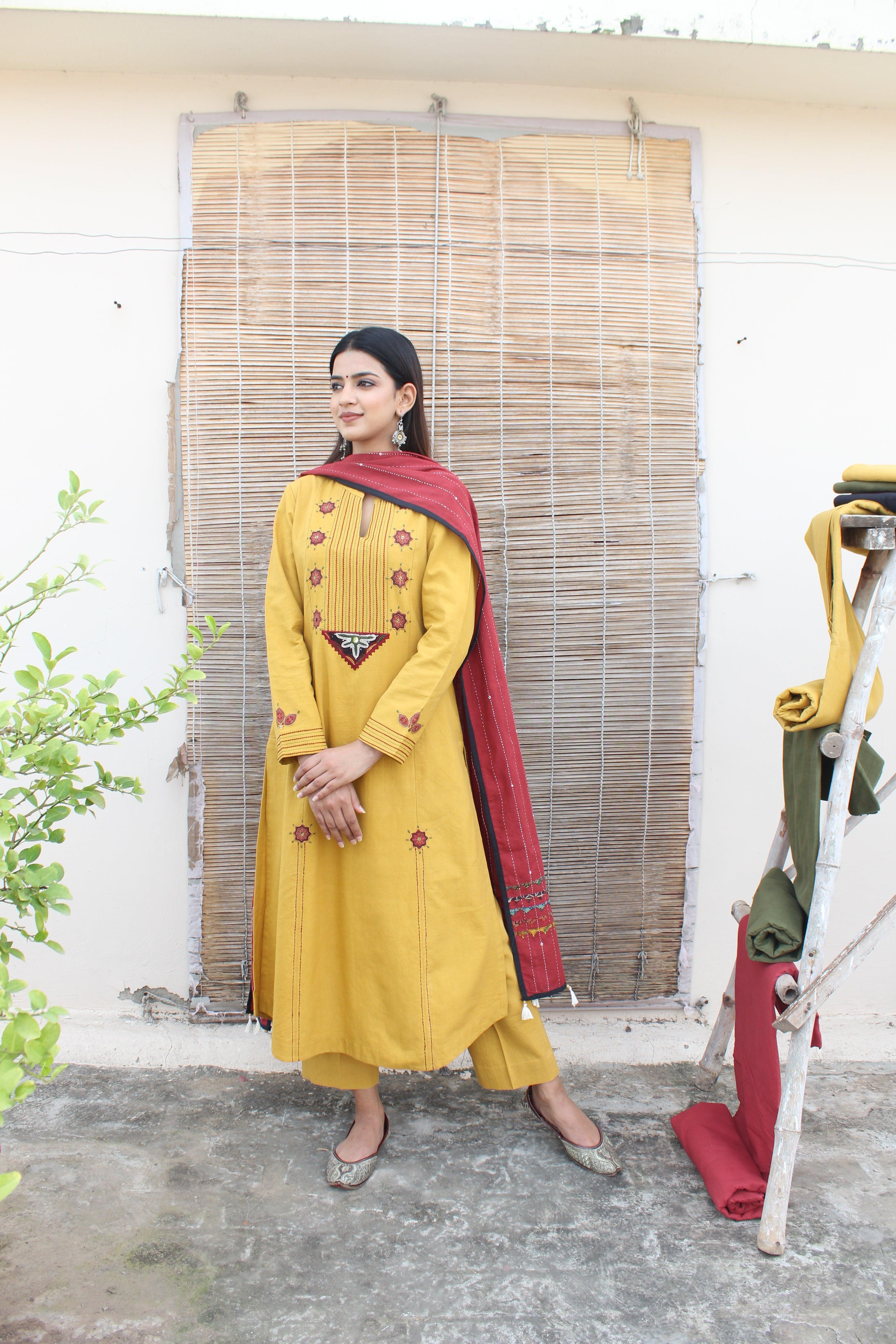 Yellow khadi kurta and pants set with Kutch embroidery and print appliqué - Sohni