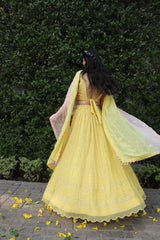 Yellow thread work georgette lehnga with hand embroidered blouse - Sohni