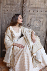 Kafoori ivory Banarasi cotton silk lehenga with peplum blouse and tissue chanderi embroidered dupatta - Sohni