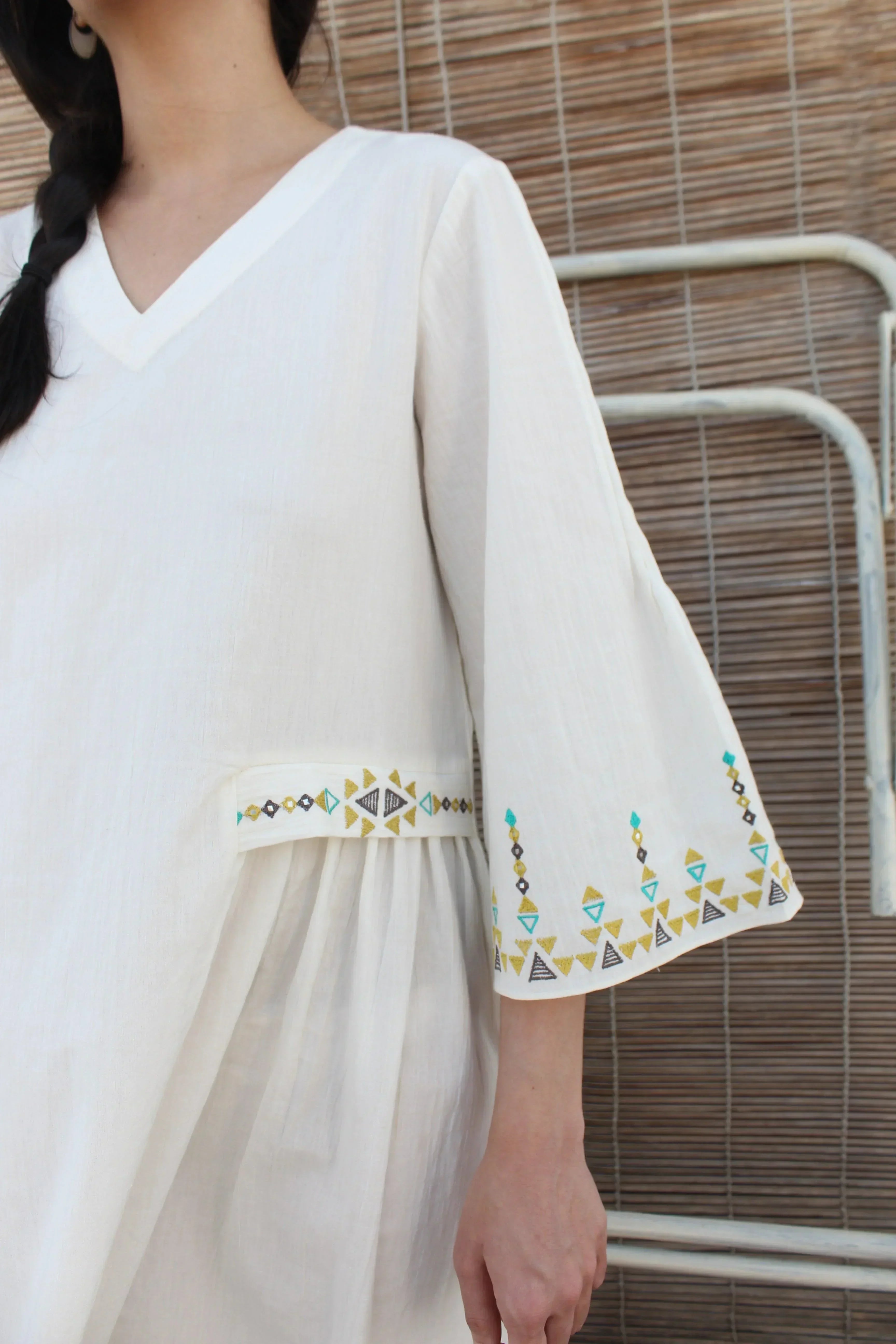 Ivory crinkle cotton midi dress with geometric folk embroidery Sohni Ivory crinkle cotton midi dress with geometric folk embroidery Sohni