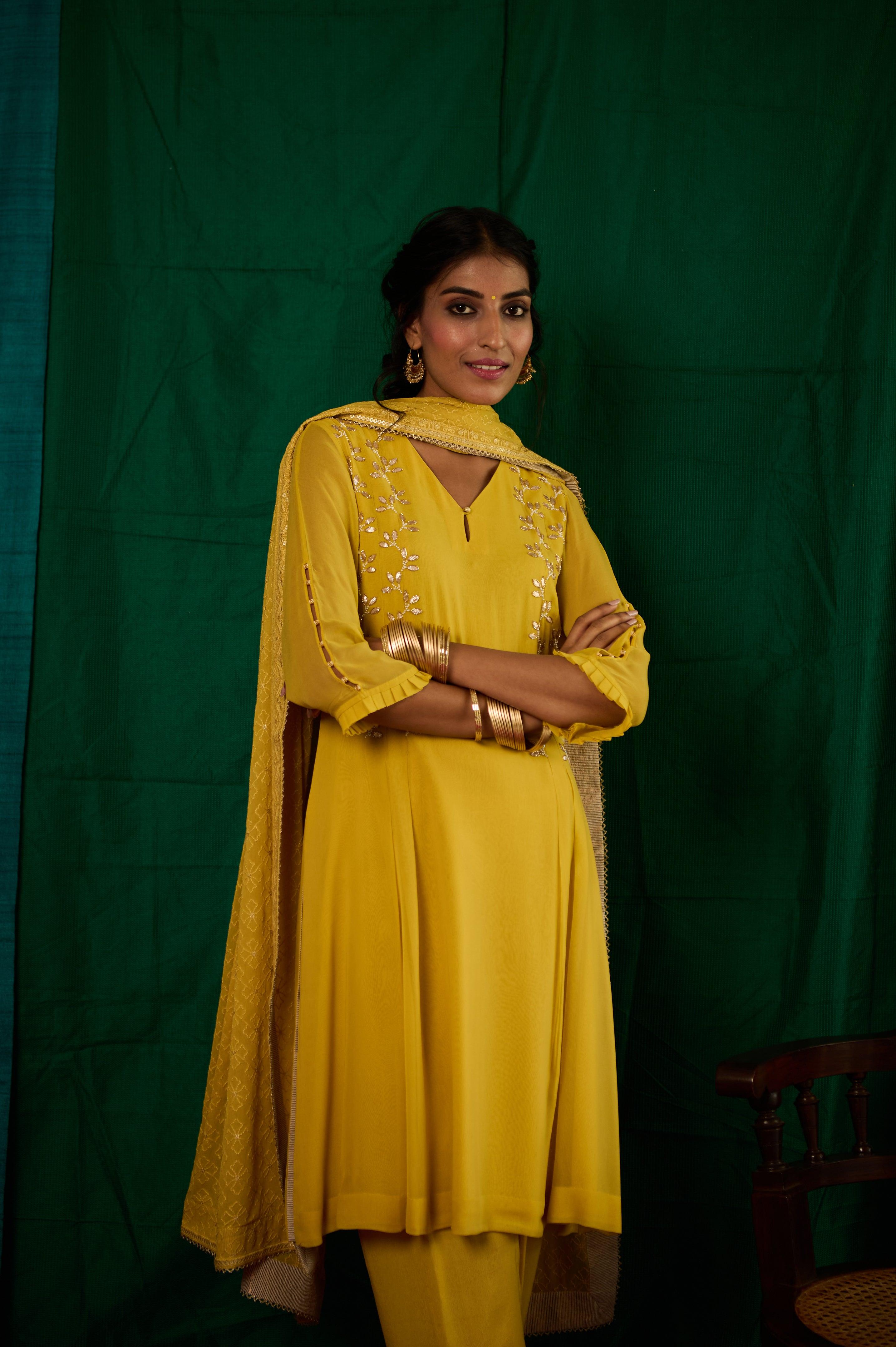 Yellow pleated gota patti embroidered kurta and salwar with thread wor   Sohni